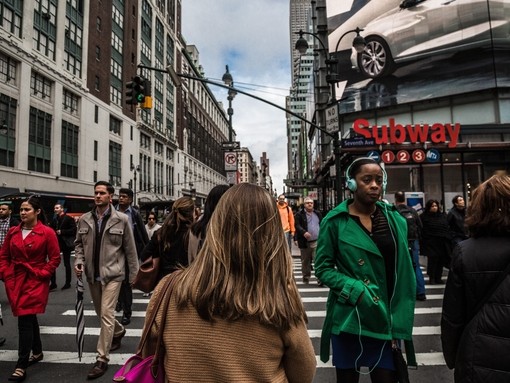People crossing a busy road