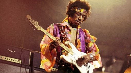 Jimi Hendrix playing an electric guitar