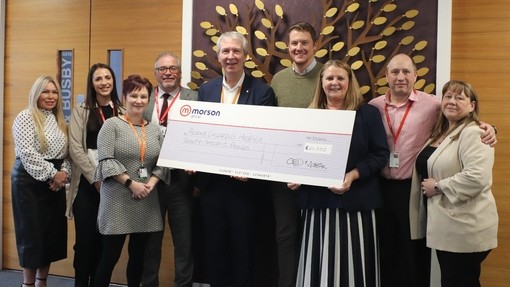 Morson Charity presenting a cheque to Acorns Children's Hospice