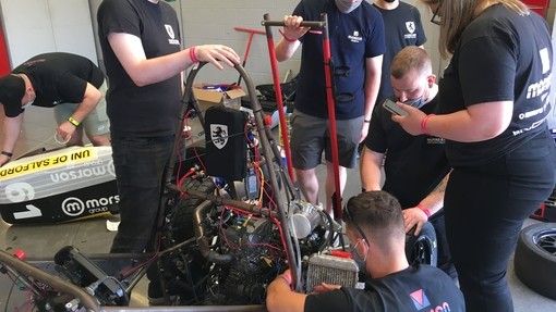 Salford Racing team working on their car
