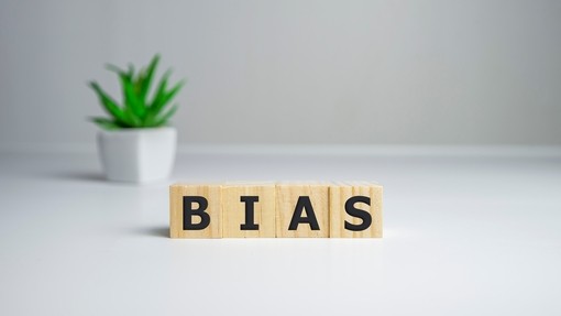 Wooden blocks spelling out bias