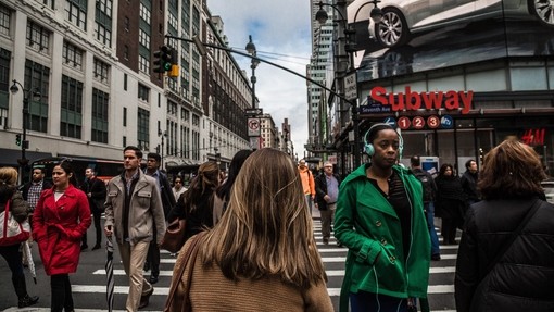 People crossing a busy road