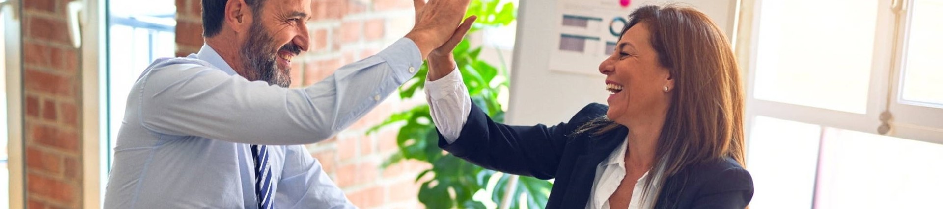 Stock image, people high fiving