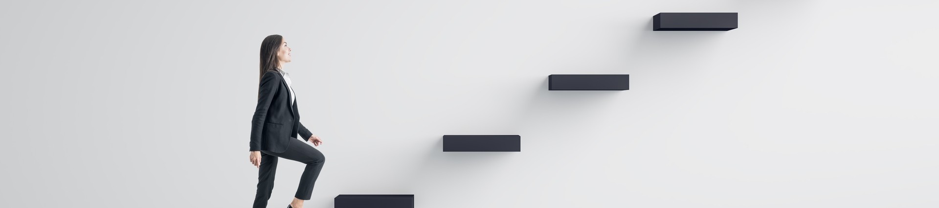 A female climbing the corporate ladder